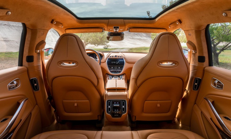 Here, have a sit inside the Aston Martin DBX SUV